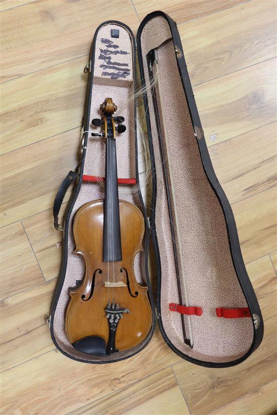 An English violin, labelled WR The Victory 1889, with medium curl to the back, sides and neck, golden brown varnish, double purfling,